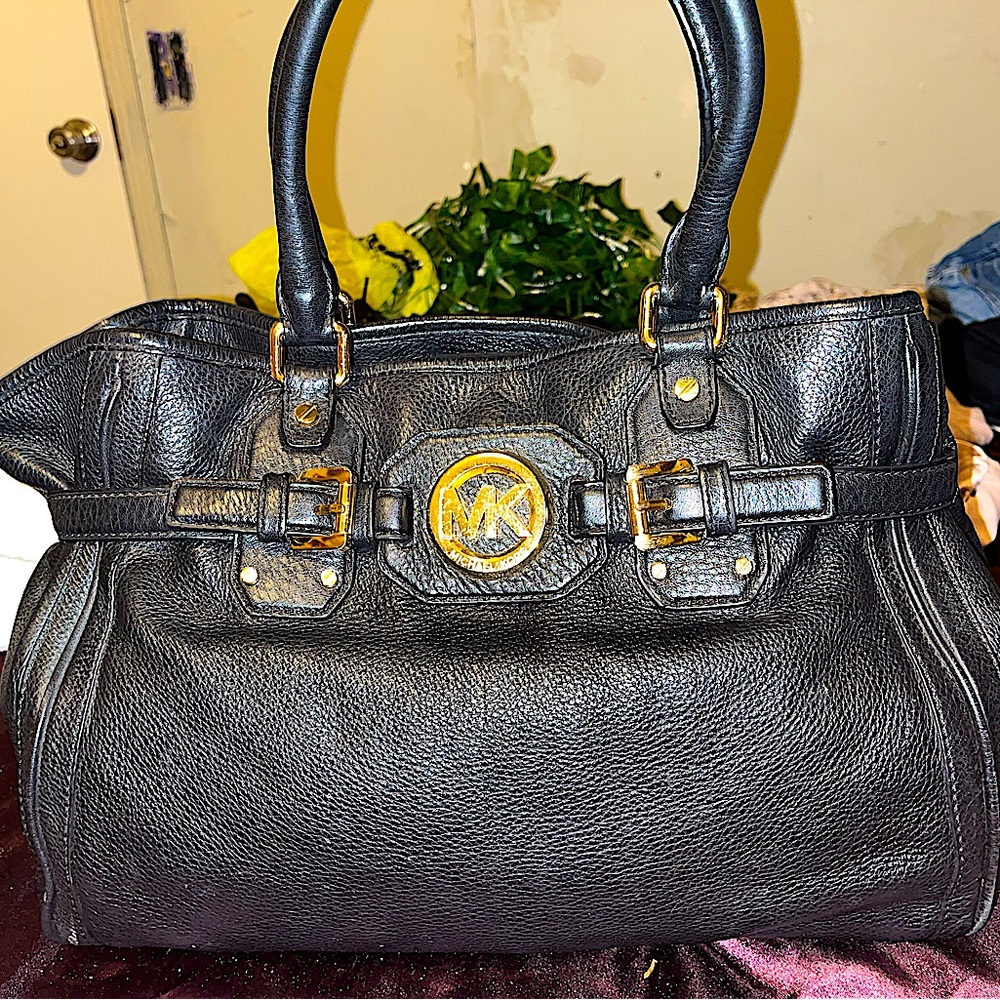 Black & gold Micheal Kors purse.